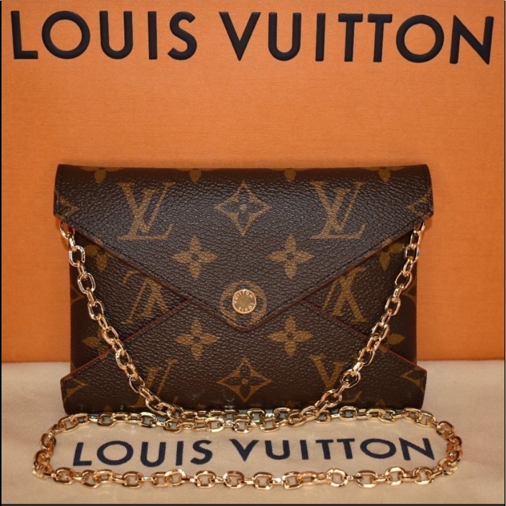 Authentic Louis Vuitton Large Kirigami with chain!